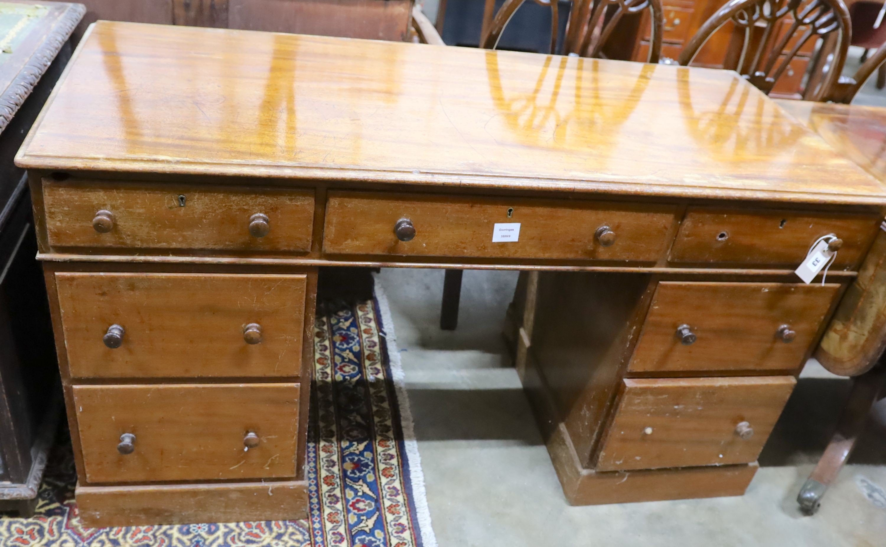 A Victorian mahogany pedestal desk, length 136cm, depth 58cm, height 76cm